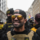 Enrique Tarrio, leader of the Proud Boys, stands outside Harry’s bar during a protest on December 12, 2020 in Washington, DC. Thousands of protesters who refuse to accept that President-elect Joe Biden won the election are rallying ahead of the electoral college vote to make Trump’s 306-to-232 loss official.